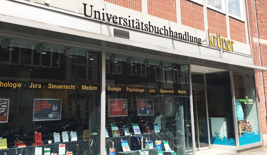 Der Eingang der Universitätsbuchhandlung Krüper, wo auch Coppenrath & Boeser zu finden ist